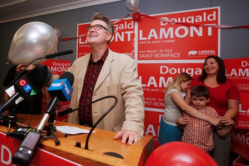 JOHN WOODS / WINNIPEG FREE PRESS
Dougald Lamont, leader of the Manitoba Liberal Party, celebrates a win in the St. Boniface by-election as his family looks on in Winnipeg Tuesday, July 17, 2018.