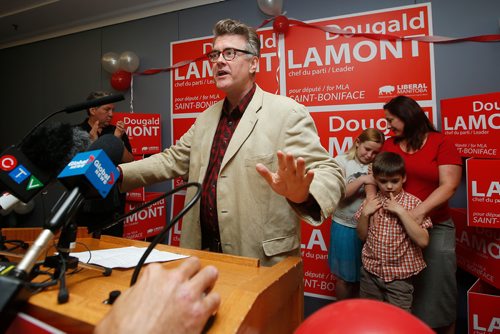 JOHN WOODS / WINNIPEG FREE PRESS
Dougald Lamont, leader of the Manitoba Liberal Party, celebrates a win in the St. Boniface by-election as his family looks on in Winnipeg Tuesday, July 17, 2018.