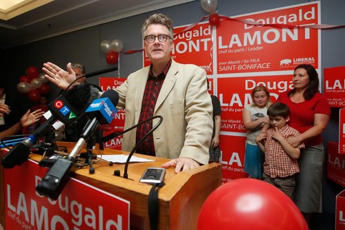 JOHN WOODS / WINNIPEG FREE PRESS
Dougald Lamont, leader of the Manitoba Liberal Party, celebrates a win in the St. Boniface by-election as his family looks on in Winnipeg Tuesday, July 17, 2018.