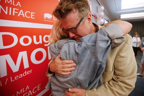 JOHN WOODS / WINNIPEG FREE PRESS
Dougald Lamont, leader of the Manitoba Liberal Party, hugs his daughter as they celebrate a win in the St. Boniface by-election in Winnipeg Tuesday, July 17, 2018.