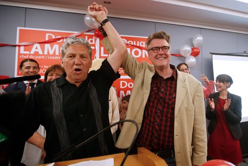 JOHN WOODS / WINNIPEG FREE PRESS
Dan Vandal, Liberal MP, and Dougald Lamont, leader of the Manitoba Liberal Party, celebrate Lamont's win in the St. Boniface by-election in Winnipeg Tuesday, July 17, 2018.