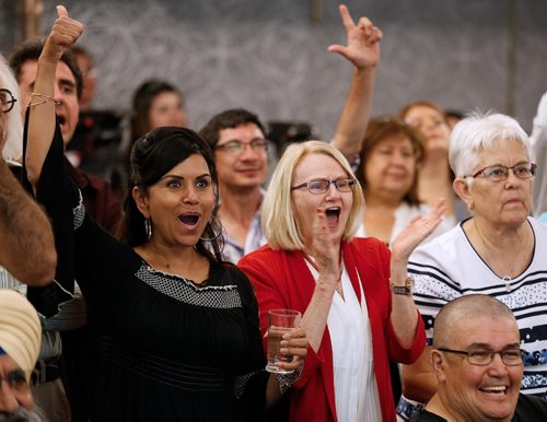 JOHN WOODS / WINNIPEG FREE PRESS
Supporters celebrate as they see positive results come in for Dougald Lamont, leader of the Manitoba Liberal Party,  in the St. Boniface by-election in Winnipeg Tuesday, July 17, 2018.