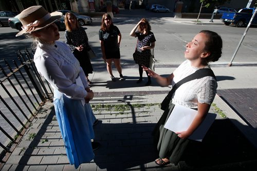 JOHN WOODS / WINNIPEG FREE PRESS
Alexandra Chase, left, and Hannah McKenna, performing tour guides, lead tours through The Exchange in Winnipeg Tuesday, July 17, 2018.