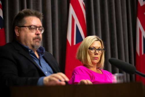 ANDREW RYAN / WINNIPEG FREE PRESS  Sustainable Development Minister Rochelle Squires listens as Don Labossiere, director of Conservation and Water Stewardship, explains the threat of high levels of lead found in St. Boniface soil at the Manitoba Legislature on July 18, 2018. After being aware of the problem for almost two months Squires did not notify residents of the contaminated soil citing a media blackout due to the by-election.
