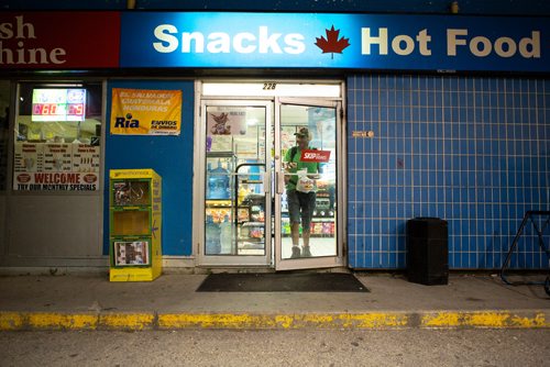 ANDREW RYAN / WINNIPEG FREE PRESS Rob Meekis walks out of Walia's Gas & Carwash after buying a slurpee around 4:00 a.m. on Friday July 13, 2018. 24hourproject