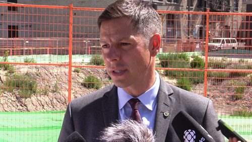 MIKE DEAL / WINNIPEG FREE PRESS
Winnipeg Mayor Brian Bowman talks about supporting the city council motion to add a referendum question to the civic election ballot regarding wether Portage Avenue and Main Street should be open to pedestrian crosswalks during a ceremony at the location where the Red River College Innovation Centre will be built.
180718 - Wednesday, July 18, 2018.