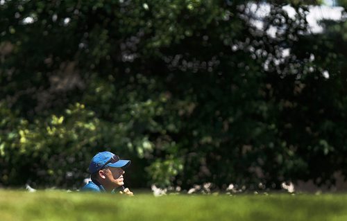 PHIL HOSSACK / WINNIPEG FREE PRESS - Todd Fanning gets a gopher's eye view of the 15th green Wednesday afternoon t Glendale Golf Club in the Manitoba Men's Amature tournament. Mike Sawatzky's story.  - July 17, 2018