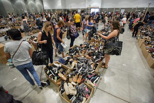 MIKE DEAL / WINNIPEG FREE PRESS
TOMS is having a warehouse sale from July 19-22 at the RBC Convention Centre. They expect about 7,000 customers on the first day and over 25,000 shoes will be available.

180719 - Thursday, July 19, 2018.