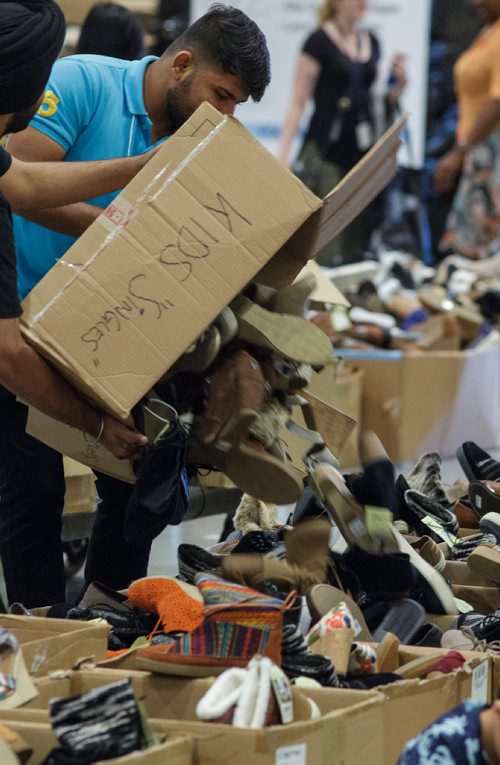 MIKE DEAL / WINNIPEG FREE PRESS
TOMS is having a warehouse sale from July 19-22 at the RBC Convention Centre. They expect about 7,000 customers on the first day and over 25,000 shoes will be available.

180719 - Thursday, July 19, 2018.