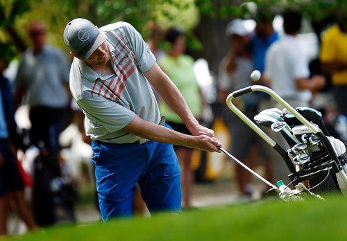 PHIL HOSSACK / WINNIPEG FREE PRESS - Eric Johnson chips onto the 18th green Thursday afternoon at Glendale Golf Club in the Manitoba Men's Amature tournament final. See taylor's tale.  - July 17, 2018