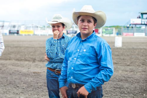 MIKAELA MACKENZIE / WINNIPEG FREE PRESS
Gibson McNarland, 10 (left), and Luke Neufeld, 13, participate in the clown act at the Manitoba Stampede in Morris on Thursday, July 19, 2018. 
Mikaela MacKenzie / Winnipeg Free Press 2018.