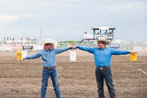 MIKAELA MACKENZIE / WINNIPEG FREE PRESS
Gibson McNarland, 10 (left), and Luke Neufeld, 13, participate in the clown act at the Manitoba Stampede in Morris on Thursday, July 19, 2018. 
Mikaela MacKenzie / Winnipeg Free Press 2018.