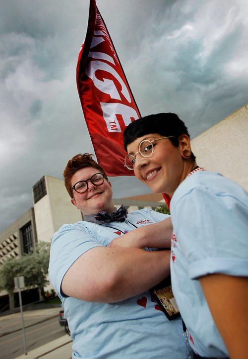 PHIL HOSSACK / WINNIPEG FREE PRESS -Saz Massey (left) and Bre Brown pose in front of Pantages Theatre while volunteering at the Fringe Festival Thursday evening. See Volunteer Column. - July 19, 2018