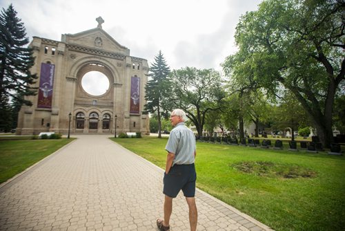 MIKAELA MACKENZIE / WINNIPEG FREE PRESS
Phil Mailhot, former director of the St. Boniface Museum, walks through the St. Boniface Cathedral ruins in Winnipeg on Friday, July 20, 2018. As a 13-year-old boy, Mailhot watched the historic fire burn.
Mikaela MacKenzie / Winnipeg Free Press 2018.