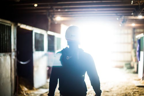 MIKAELA MACKENZIE / WINNIPEG FREE PRESS
Jockey Antonio Whitehall walks out of the barns at the Assiniboia Downs in Winnipeg on Thursday, July 19, 2018. 
Mikaela MacKenzie / Winnipeg Free Press 2018.