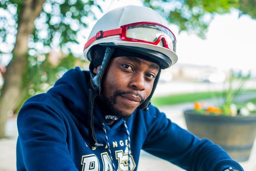 MIKAELA MACKENZIE / WINNIPEG FREE PRESS
Jockey Antonio Whitehall poses for a portrait at the Assiniboia Downs in Winnipeg on Thursday, July 19, 2018. 
Mikaela MacKenzie / Winnipeg Free Press 2018.