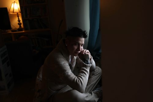 RUTH BONNEVILLE / WINNIPEG FREE PRESS


Portraits of Gabriel Guiboche sitting next to the front window at his dads home in Winnipeg Thursday.  

Story on Gabriel Guiboche, a  First Nations man who was transitioning to a woman when he was arrested for breaching a no-contact order involving his female partner 

The story focuses on the conduct and strip-search policy of the police and remand centre. He feels this whole process has stopped his transition  he was on estrogen before but doesn't feel comfortable going ahead with that now, because it was traumatic, in his view. 
Photo taken are of him presenting as a male. 


Story by Dylan Robertson  | Ottawa Correspondent



July 19,  2018 

