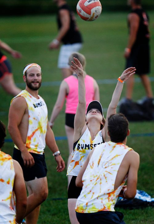 PHIL HOSSACK / WINNIPEG FREE PRESS - SUPERSPIKE - Participants in the annual beach volleyball tournament enjoy the game Friday night at Maple Grove Park. See story. - July 20, 2018