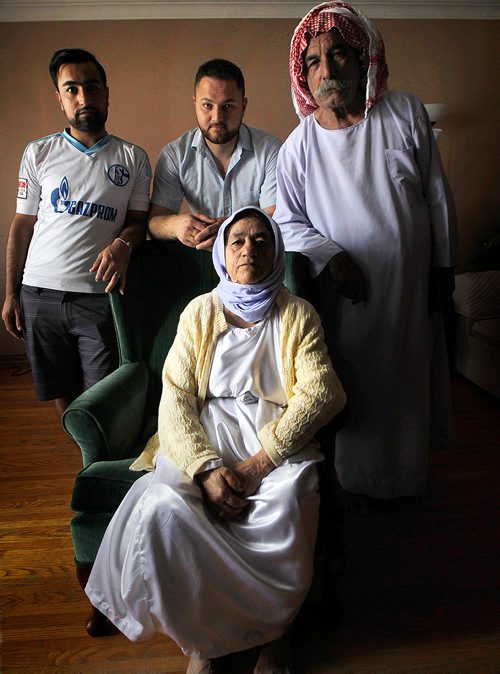 PHIL HOSSACK / WINNIPEG FREE PRESS - left to right, back row, Fawwaz Samoqi, Faissal Nassal and Sleman Smoqi. Sleman's wife Adul Nimr sits front.  See Brenda Suderman's story.  - July 20, 2018