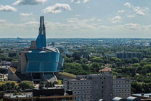 MIKE DEAL / WINNIPEG FREE PRESS
Views of the CMHR and South East Winnipeg from the 17th floor offices of Thompson Dorfman Sweatman (TDS) at True North Square Monday morning.
180723 - Monday, July 23, 2018.