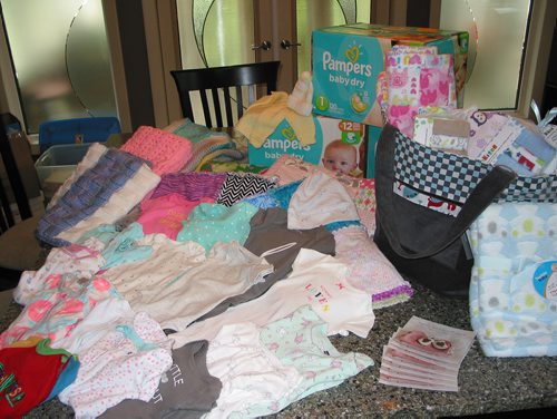 Canstar Community News July 16, 2018 - These baby items, including handmade blankets, are among those donated to the Nighty Noodles project that collects baby clothing and supplies for distribution to non-profit organizations that support families in Winnipeg and Edmonton. (ANDREA GEARY/CANSTAR COMMUNITY NEWS)