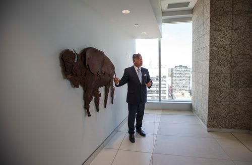 MIKE DEAL / WINNIPEG FREE PRESS
Jeff Hirsch from TDS talks about the amazing fine art that decorates the walls of the 17th floor offices of Thompson Dorfman Sweatman (TDS) at True North Square Monday morning. 
180723 - Monday, July 23, 2018.