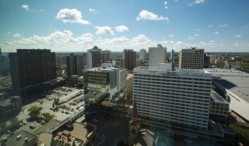 MIKE DEAL / WINNIPEG FREE PRESS
Views of Winnipeg from the 17th floor offices of Thompson Dorfman Sweatman (TDS) at True North Square Monday morning.
180723 - Monday, July 23, 2018.