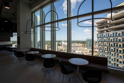 MIKE DEAL / WINNIPEG FREE PRESS
Tables in the kitchen area of the 17th floor offices of Thompson Dorfman Sweatman (TDS) at True North Square Monday morning. 
180723 - Monday, July 23, 2018.