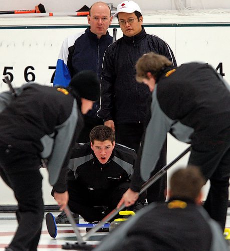 BORIS MINKEVICH / WINNIPEG FREE PRESS 090129 Deaf curlers Michael Raby and Damian Hum talk with their hands while watching the Kyle Peters team.