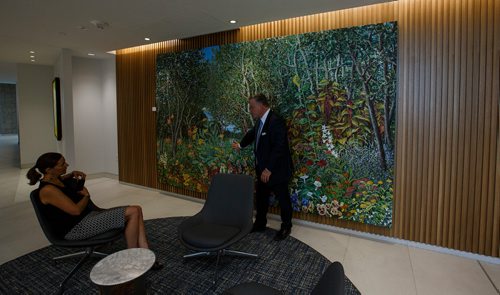 MIKE DEAL / WINNIPEG FREE PRESS
Jeff Hirsch from TDS talks about the amazing fine art that decorates the walls of the 17th floor offices of Thompson Dorfman Sweatman (TDS) at True North Square Monday morning. 
180723 - Monday, July 23, 2018.