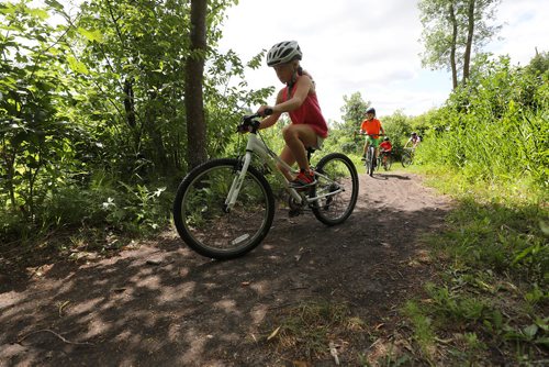 RUTH BONNEVILLE / WINNIPEG FREE PRESS

Standup  photo 


Mike Pizzi and his three kids, Jianna (9yrs, pink), Julen (9yrs, twin, orange) and Luca (red), bike the trails to a lunch spot where they planned to have a picnic at Beaudry Park Monday.  




July 23,  2018 

