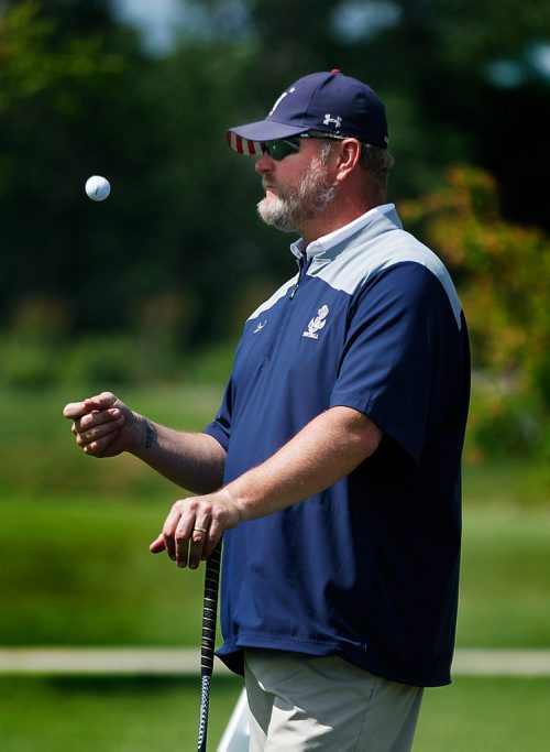 PHIL HOSSACK / WINNIPEG FREE PRESS - Almost patiently, Rick Forney waits for his turn to tee off Monday afternoon on Breezy Bend's back nine Monday. STANDUP   - July 23, 2018
