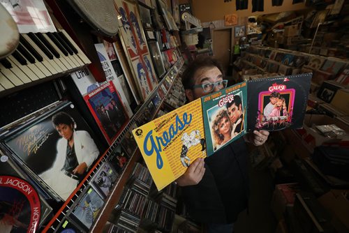 RUTH BONNEVILLE / WINNIPEG FREE PRESS


Jeff Bishop owner of Sound Exchange at 557 Portage Ave. poses with the 3 Grease albums in his store Monday.  
For  40th anniversary of the movie Grease.

See Sanderson story. 
July 23,  2018 

