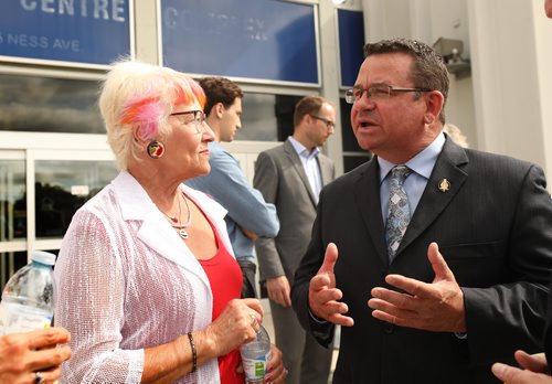 RUTH BONNEVILLE / WINNIPEG FREE PRESS


Municipal relations minister Jeff Wharton, talks with Marilyn Robinson, past president of the 55 Plus, St. James Seniors Association after announcing that the Manitoba government  has committed to  3.9 million in upgrades to the St. James Civic Centre on Tuesday morning outside the centre.  

Standup only.  

July 24,  2018 

