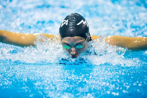 MIKAELA MACKENZIE / WINNIPEG FREE PRESS
Oksana Chaput swims the 100m butterfly in the junior championships at the Pan Am Pool in Winnipeg on Wednesday, July 25, 2018. 
Winnipeg Free Press 2018.