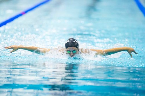 MIKAELA MACKENZIE / WINNIPEG FREE PRESS
Oksana Chaput swims the 100m butterfly in the junior championships at the Pan Am Pool in Winnipeg on Wednesday, July 25, 2018. 
Winnipeg Free Press 2018.