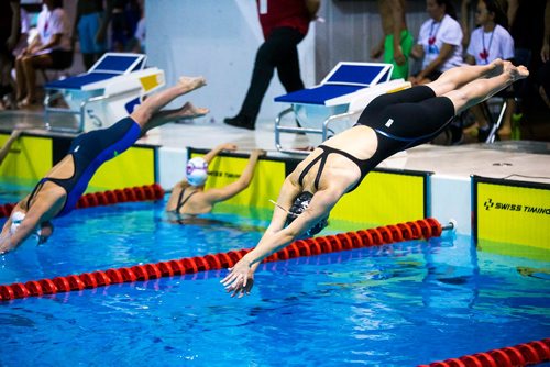 MIKAELA MACKENZIE / WINNIPEG FREE PRESS
Oksana Chaput swims the 100m butterfly in the junior championships at the Pan Am Pool in Winnipeg on Wednesday, July 25, 2018. 
Winnipeg Free Press 2018.