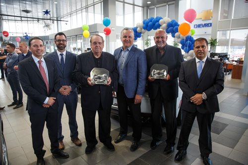 MIKE DEAL / WINNIPEG FREE PRESS
(from left) Felipe Mitchel, GM District Manager, Nicolas Longpré, GM Regional Sales Manager, Western Region, Jim Gauthier, Chairman, Jason Cross, VP, Randy Gauthier, President, and Jarrett Beyko, VP, and their General Motors President Club Awards Tuesday morning at Jim Gauthier Chevrolet on McPhillips Blvd.
180725 - Wednesday, July 25, 2018.