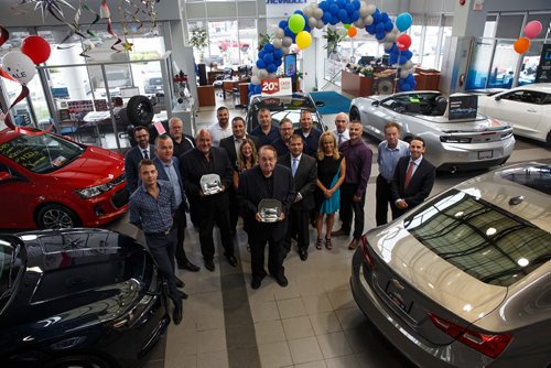 MIKE DEAL / WINNIPEG FREE PRESS
Chairman, Jim Gauthier (front centre), with the management teams from two Gauthier dealerships and their General Motors President Club Awards Tuesday morning.
180725 - Wednesday, July 25, 2018.