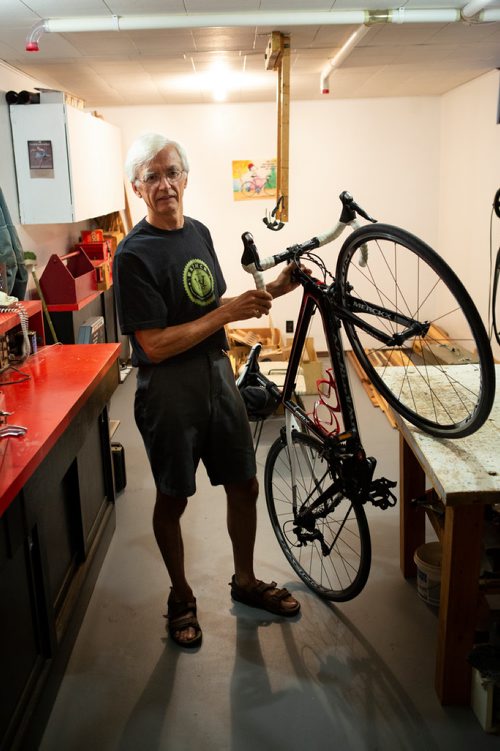 ANDREW RYAN / WINNIPEG FREE PRES Ken Schykulski, 60, is a volunteer bike mechanic at the WRENCH (Winnipeg Repair Education and Cycling Hub). Schykulski poses for a portrait in his basement workshop on July 24, 2018.