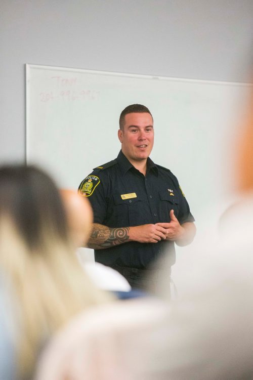 MIKAELA MACKENZIE / WINNIPEG FREE PRESS
Constable Shawn Smith speaks at the Winnipeg Police Service Diversity Career Exhibition, open to Indigenous and newcomer community members interested in a career in law enforcement, at the Winnipeg Police Headquarters in Winnipeg on Thursday, July 26, 2018. 
Winnipeg Free Press 2018.