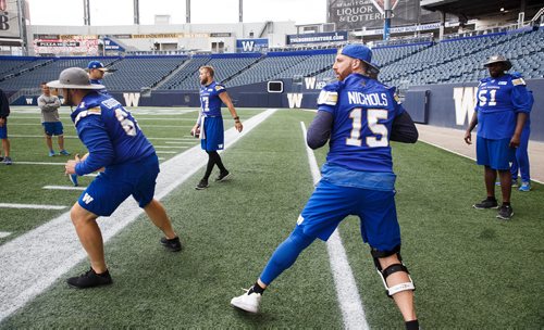 MIKE DEAL / WINNIPEG FREE PRESS
Winnipeg Blue Bombers quarterback Matt Nichols (15) during a walk-thru practice at Investors Group Field Thursday morning.
180726 - Thursday, July 26, 2018.