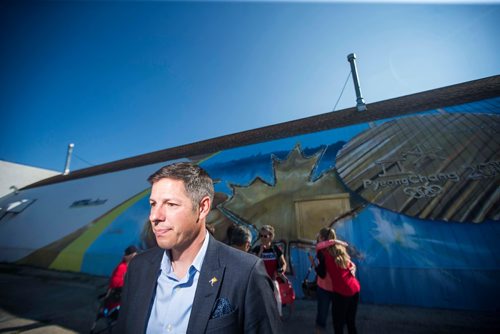 MIKAELA MACKENZIE / WINNIPEG FREE PRESS
Mayor Brian Bowman answers questions from the media about the Investors Group Field financing deal after the unveiling of the St.Vital Curling Club's newest mural in Winnipeg on Friday, July 27, 2018. 
Winnipeg Free Press 2018.
