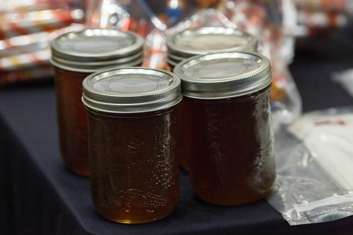 MIKE DEAL / WINNIPEG FREE PRESS
Marihuana oil or "Honey" oil in four mason jars were part of the seizure.
Around 1000 lbs of marihuana and related materials were caught in a standard regulatory inspection stop by an RCMP officer on the Trans-Canada Highway in Westhawk, MB on July 22, 2018. According to the RCMP the seizure is the largest marihuana seizure through a traffic stop in Canada since 2015.
The drugs were put on display for the media at D Division Headquarters Friday morning.
180727 - Friday, July 27, 2018.