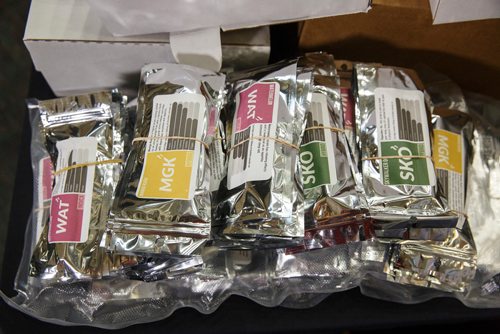 MIKE DEAL / WINNIPEG FREE PRESS
Individual packages of marihuana were part of the seizure.
Around 1000 lbs of marihuana and related materials were caught in a standard regulatory inspection stop by an RCMP officer on the Trans-Canada Highway in Westhawk, MB on July 22, 2018. According to the RCMP the seizure is the largest marihuana seizure through a traffic stop in Canada since 2015.
The drugs were put on display for the media at D Division Headquarters Friday morning.
180727 - Friday, July 27, 2018.