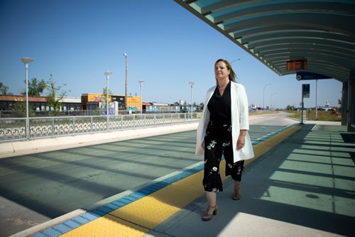 ANDREW RYAN / WINNIPEG FREE PRES Jenny Motkaluk walks down an empty BRT terminal at Jubilee Southwest station before making a speech criticizing Winnipeg mayor Brian Bowman for investing millions into the infrastructure on July 27, 2018.