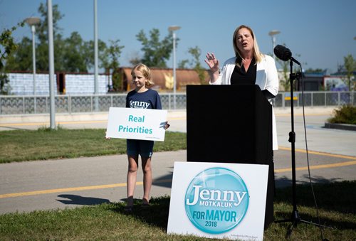 ANDREW RYAN / WINNIPEG FREE PRESS Jenny Motkaluk and her daughter Sprague Emily speaks at a press event in an empty BRT terminal at Jubilee Southwest station criticizing Winnipeg mayor Brian Bowman for investing millions into the infrastructure on July 27, 2018.