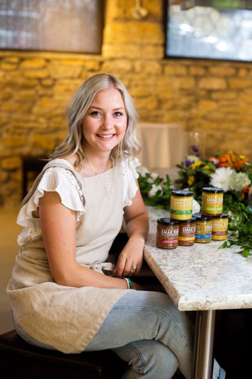 MIKAELA MACKENZIE / WINNIPEG FREE PRESS
Carly Minish, owner of Smak Dab mustard, poses for a portrait in Winnipeg on Friday, July 27, 2018. 
Winnipeg Free Press 2018.