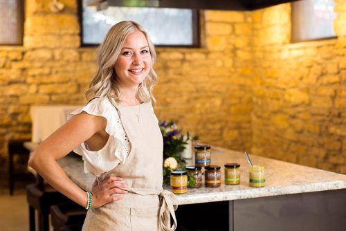 MIKAELA MACKENZIE / WINNIPEG FREE PRESS
Carly Minish, owner of Smak Dab mustard, poses for a portrait in Winnipeg on Friday, July 27, 2018. 
Winnipeg Free Press 2018.