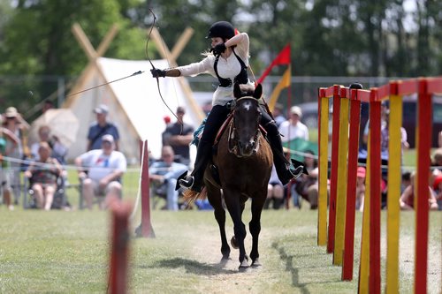 TREVOR HAGAN / WINNIPEG FREE PRESS
Rebecca Bernardin, from Crescent Moon Horseback Archers, riding Sally, doing a demonstration at the Medieval Festival in Cooks Creek, Sunday, July 29, 2018.